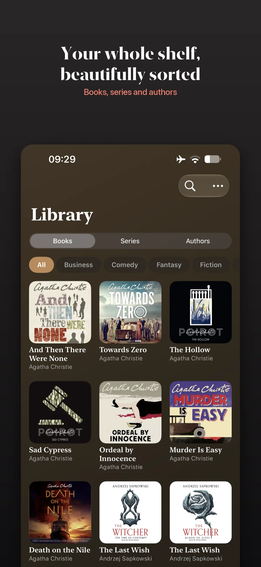 Volume on iPhone &ndash; library grid of audiobook cover art with genre filters